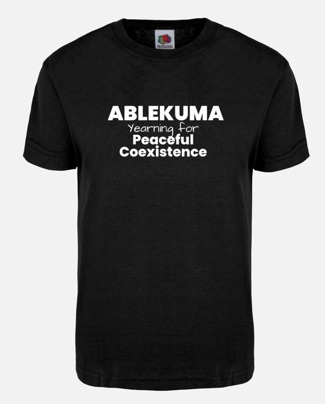 Black classic unisex short sleeves cotton t-shirt proudly stamped in front with the words  "Ablekuma yearning for peaceful coexistence".